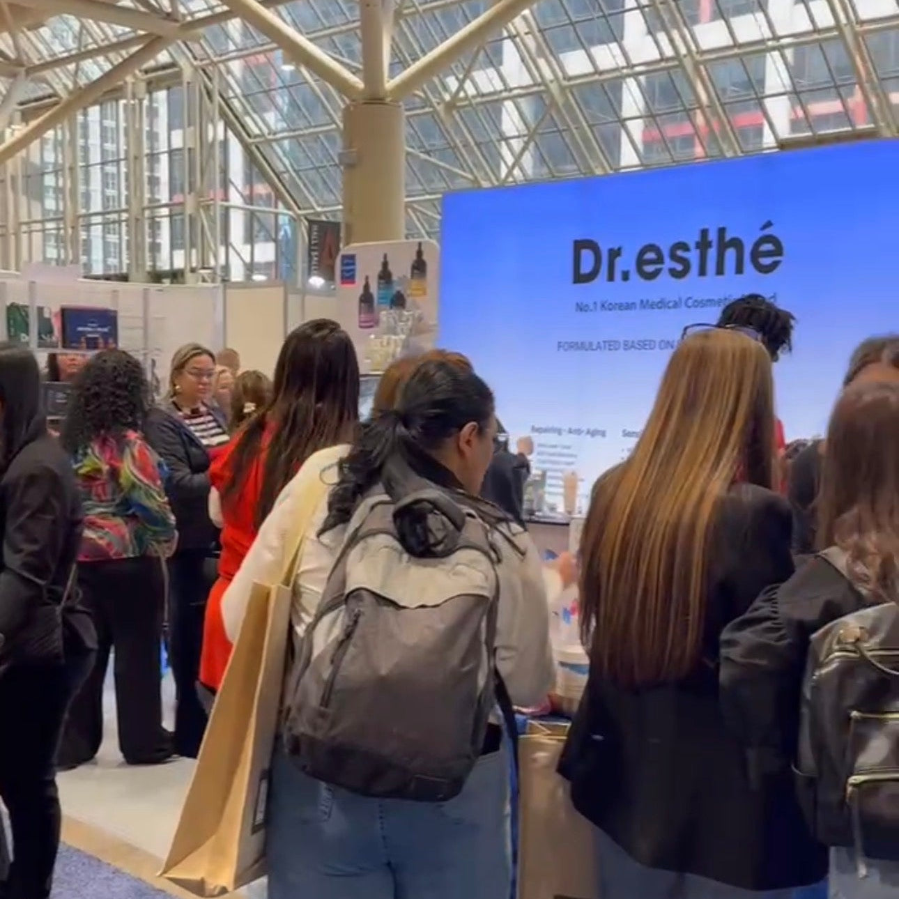 many visitors, estheticians, medical aestheticians, nurses at We Do Beauty Supply booth at ESI Show Toronto. Many visitos checking out premium medical grade Korean skincare products by Dr. Esthe, Dermabell, Doclab, Eclat du teint