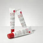 Three tubes of AC Clean Spot Gel on a light gray background