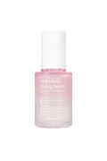 A bottle of Anti-Mela Toing Serum with a pink label and clear liquid visible inside.