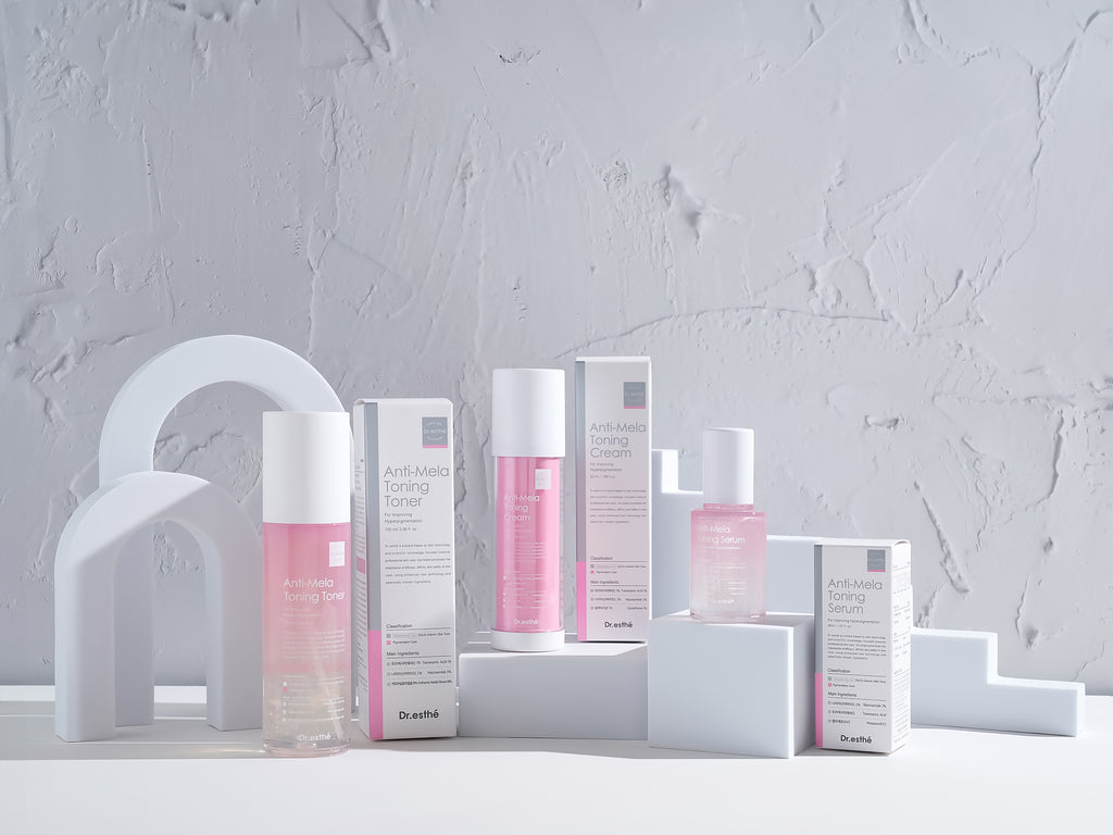 Skincare products with packaging on a gray background