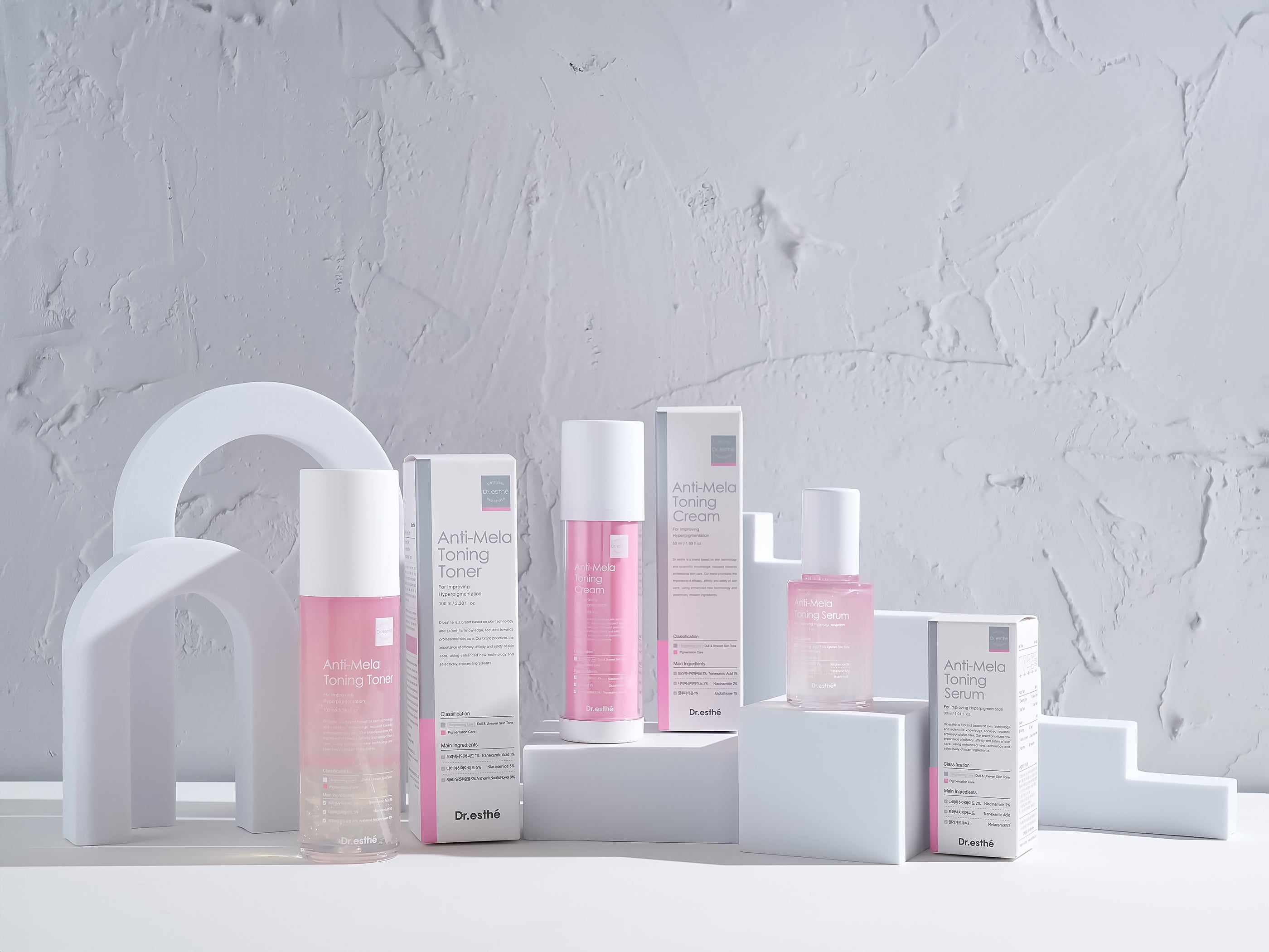 Skincare products with packaging on a gray background