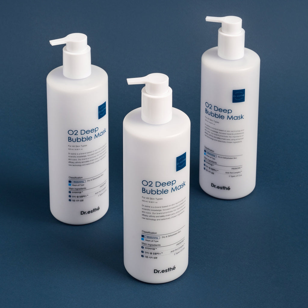 Three bottles of Dr. Esthe O2 Deep Bubble Mask on a blue background
