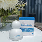 Dr. Sante Soother Cooler with packaging on a surface with flowers in the background