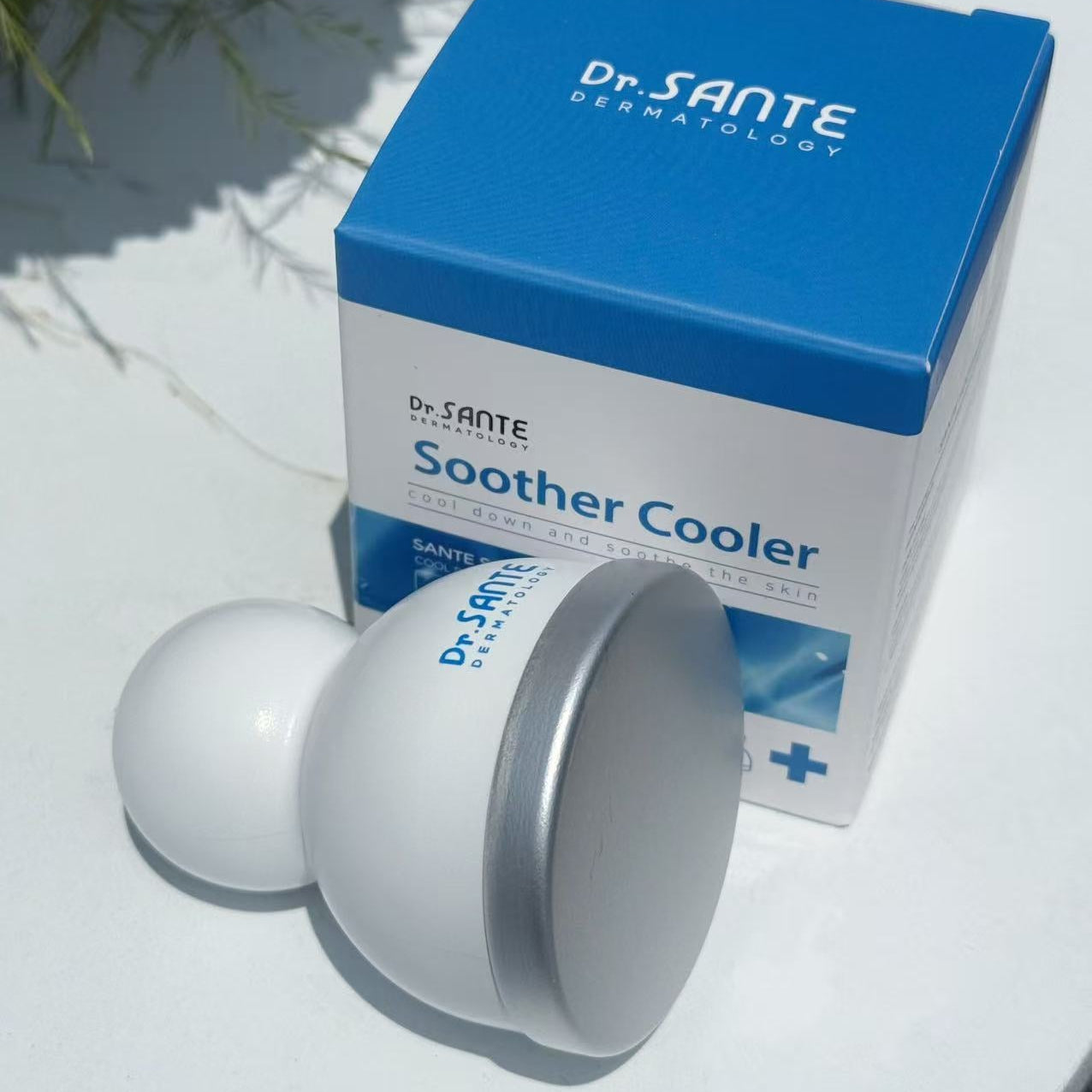 Dr. Sante Soother Cooler packaging on a white surface with a blurred natural background